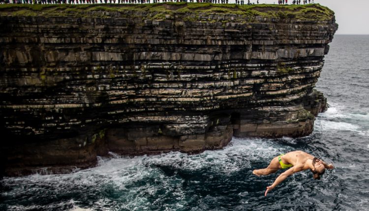 Catalin-Preda-Romania-dives-off-the-27.5-metre-platform-at-the-Red-Bull-Cliff-Diving-World-Series-Downpatrick-Head-Ireland-September-2021.-©-Morgan-Treacy